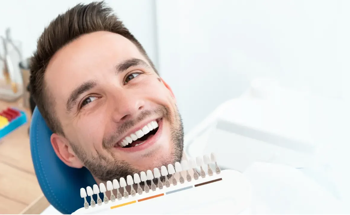 a man smiling and showing his white teeth at Block Diamond