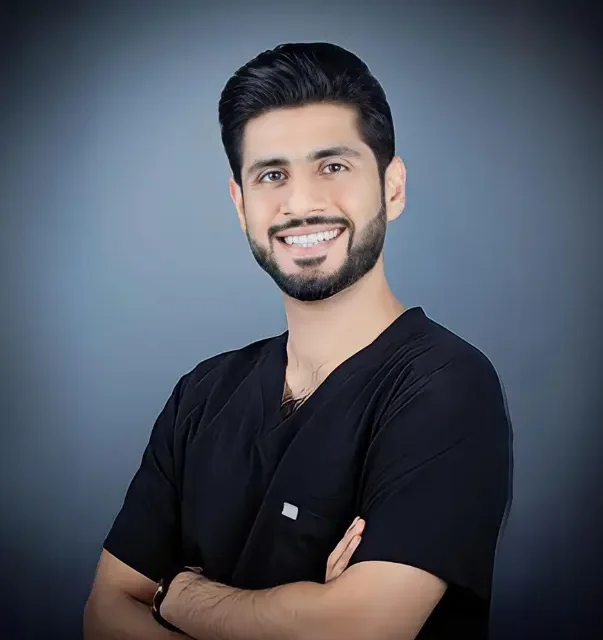 Dr Abdullah Shahnawaz Black Shirt Smiling