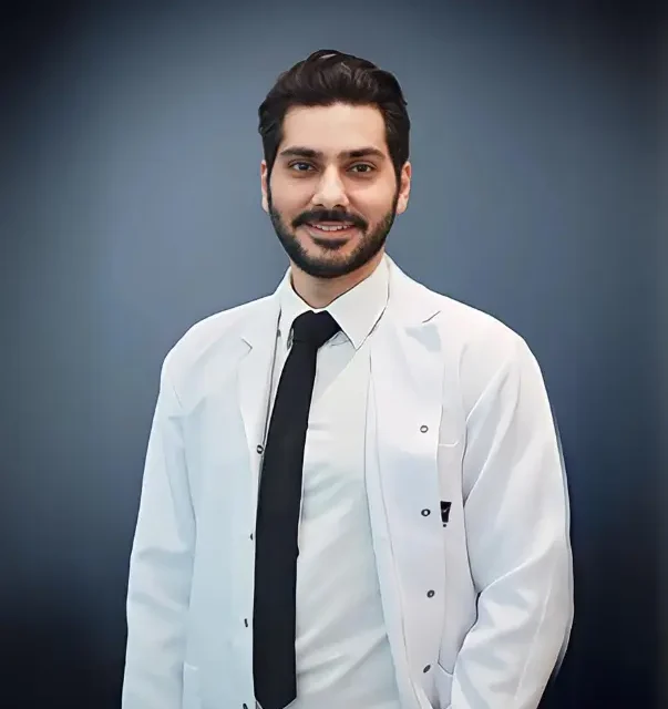 Dr Sina Ali Black Tie White Coat